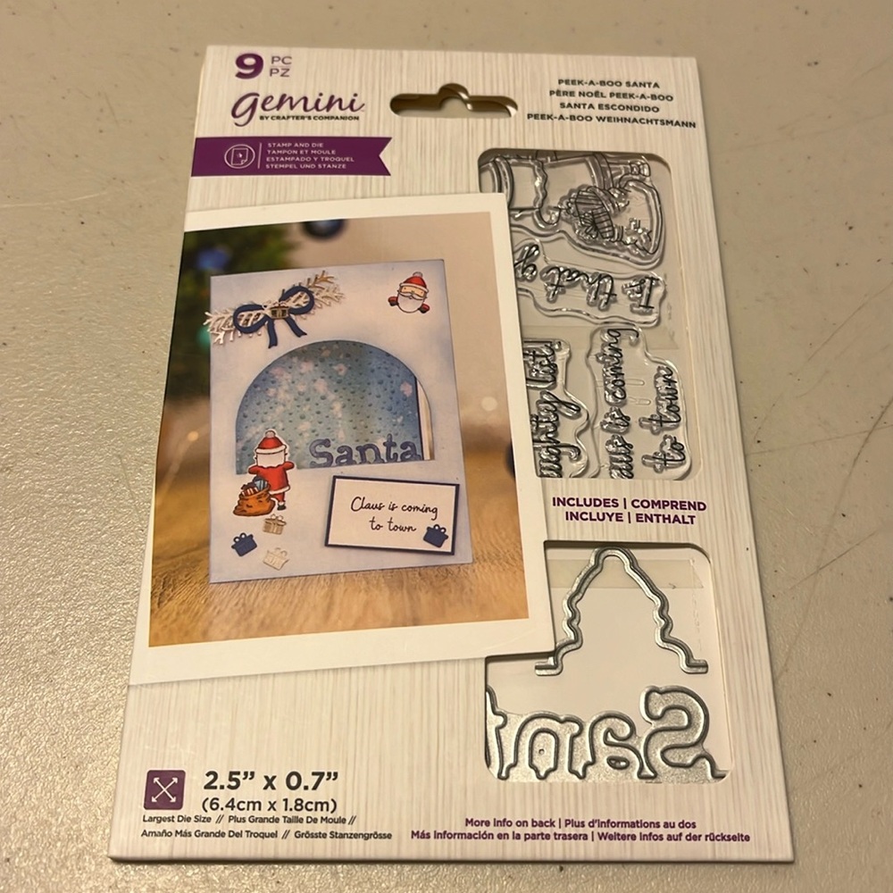 Gemini peek a boo Santa stamps and a couple dies